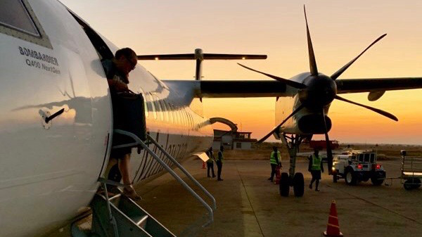 Malawi 071619 plane and sunset.png